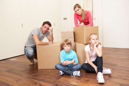 Careful handling of sofas, tables, and wardrobes for local storage