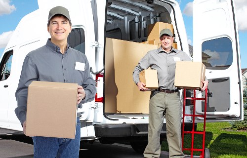 Professional movers loading furniture for a local Kennington move